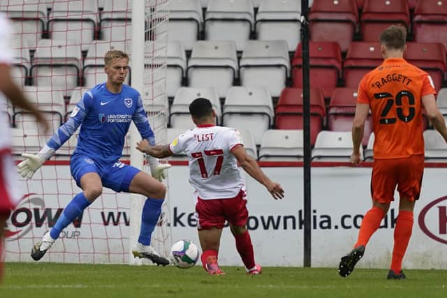 Charlie Carter puts Stevenage 1-0 up against Pompey. Picture: Jason Brown
