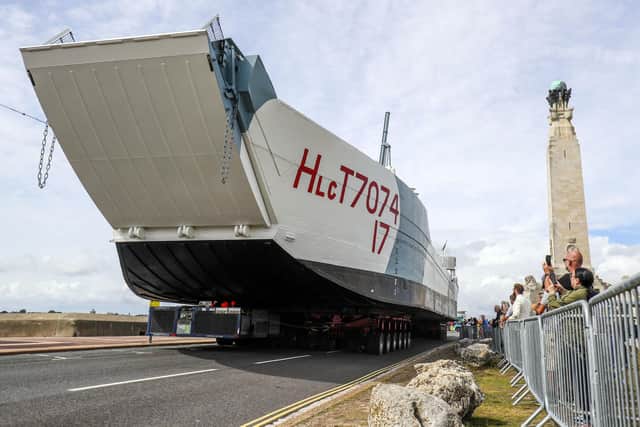 Restored World War Two landing craft LCT 7074 is transported from from the Naval Base in Portsmouth to its final resting place at the D-Day Story at Southsea. PA Photo. Picture date: Monday August 24, 2020. Steve Parsons/PA Wire