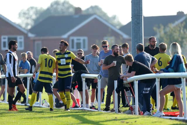Words are exchanged on the touchline following Danny Lane's goal for Paulsgrove at Hayling. Picture: Chris Moorhouse