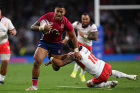 Manu Tuilagi of England breaks the tackle of Kurt Morath of Tonga during the Quilter Autumn Nations Series match between England and Tonga at Twickenham Stadium on November 06, 2021 in London, England. Photo by Mike Hewitt/Getty Images