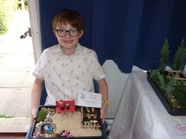 Albert with his Garden in A Seed Tray