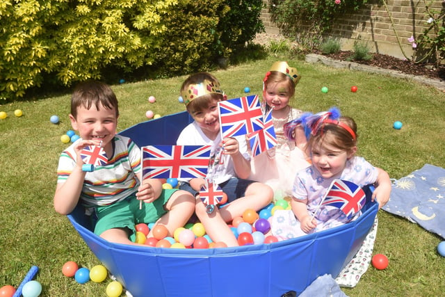 From left, Luke Ellard, six, Charlie Young, six, Molly Young, three, and Emmylou Flanagan, two, at Lower Bere Wood's street party in Waterlooville (030622-9037)