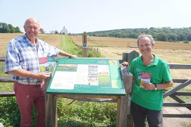 Andrew Callender and Doug Jones with the new interpretation and public walk leaflets. Picture: Jeff Travis/South Downs National Park Authority
