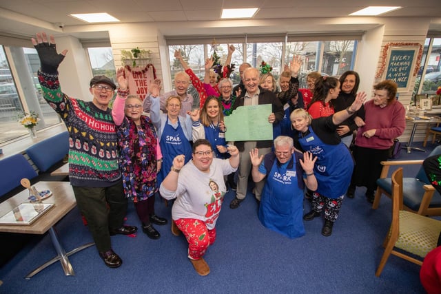 Staff and visitors celebrate Maisie Smith's 104th Birthday at Sparks Community Centre, Fratton, Portsmouth on Thursday 21st December 2023
Pictured: Staff and visitors and Maisie's son, Robin Bartlett celebrating at Sparks Community Centre
Picture: Habibur Rahman