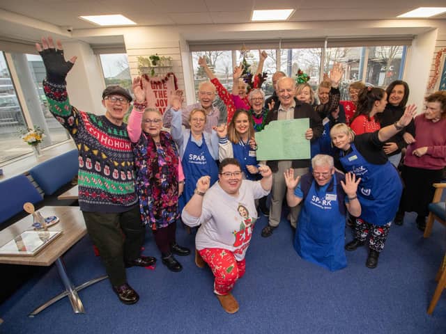 Staff and visitors celebrate Maisie Smith's 104th Birthday at Sparks Community Centre, Fratton, Portsmouth on Thursday 21st December 2023

Pictured: Staff and visitors and Maisie's son, Robin Bartlett celebrating at Sparks Community Centre

Picture: Habibur Rahman