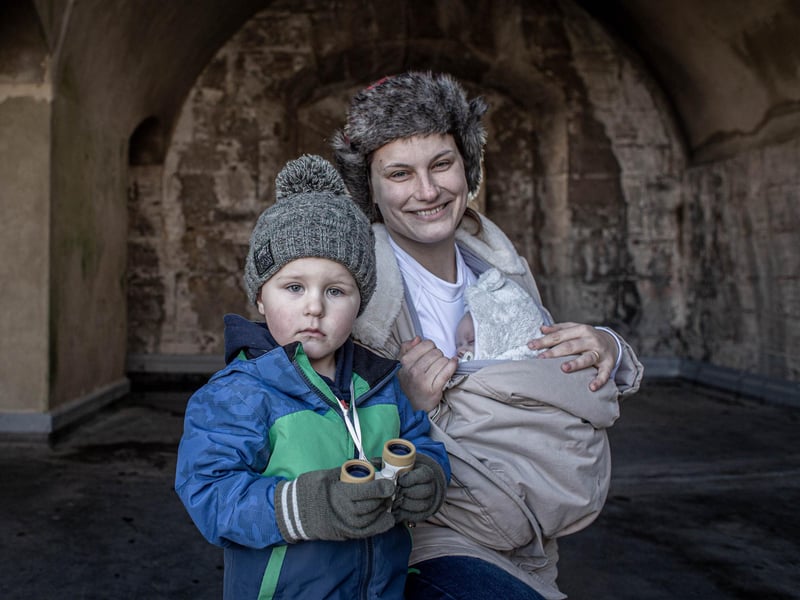HMS Prince of Wales deployed from Portsmouth naval base on Monday 12th February 2024. Pictured: Monika Holton with her children at the Round Tower, Old Portsmouth. Picture: Habibur Rahman