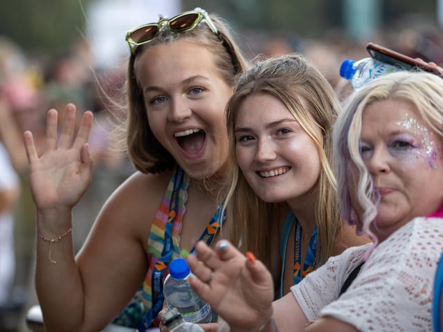 Pictured - Crowds enjoying Dodie Performing on the Common Stage. Photos by Alex Shute