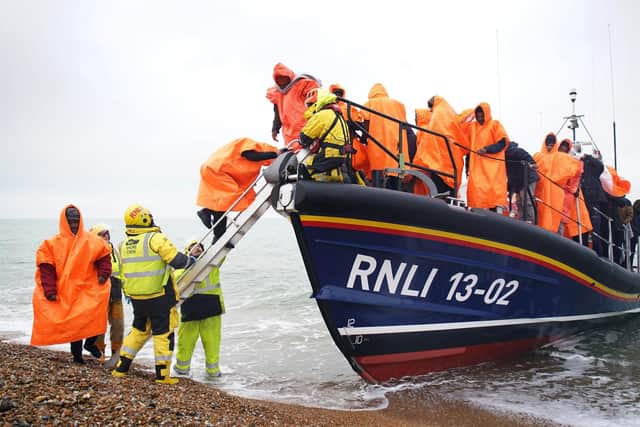 Migrants rescued by the RNLI following a small boat incident in the Channel. Pic Gareth Fuller/PA Wire