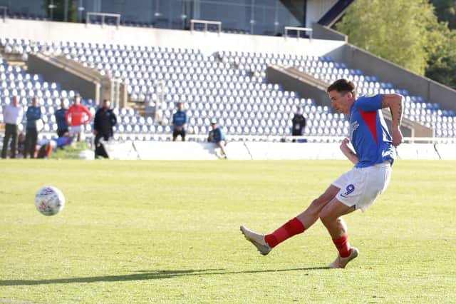 Oli Hawkins final Pompey touch was scoring a penalty in the play-off semi-final elimination at Oxford United. Picture: Robin Jones/Getty Images
