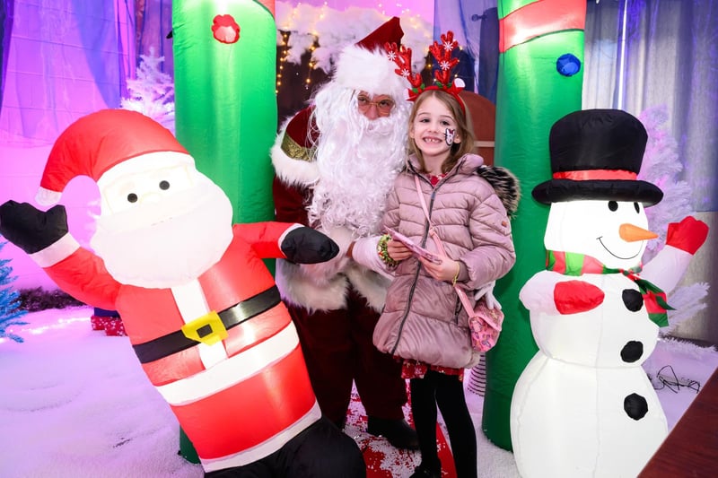 Lexie McLaverty, 7 visits Santa in his grotto at the Wickham Christmas lights switch on and fayre