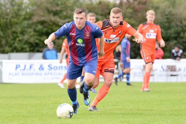 Callum Glenn in possession for USP during their FA Vase win at AFC Portchester. Pic: Martyn White.