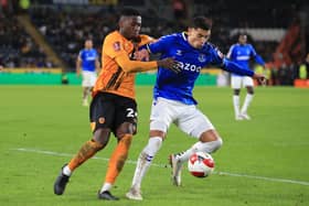 Di'Shon Bernard, on loan at Hull, competes with Everton's Ben Godfrey in the FA Cup third round last season. Picture: LINDSEY PARNABY/AFP via Getty Images