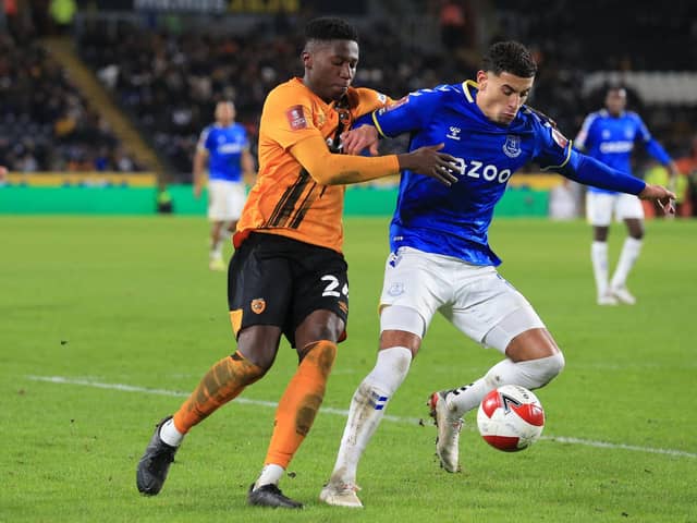 Di'Shon Bernard, on loan at Hull, competes with Everton's Ben Godfrey in the FA Cup third round last season. Picture: LINDSEY PARNABY/AFP via Getty Images
