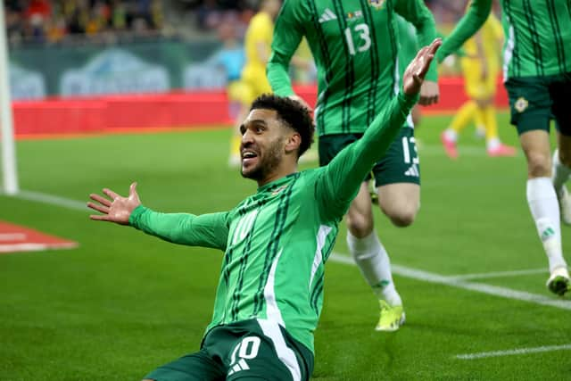 Northern Ireland’s Jamie Reid celebrates scoring against Romania. PIC: William Cherry/Presseye