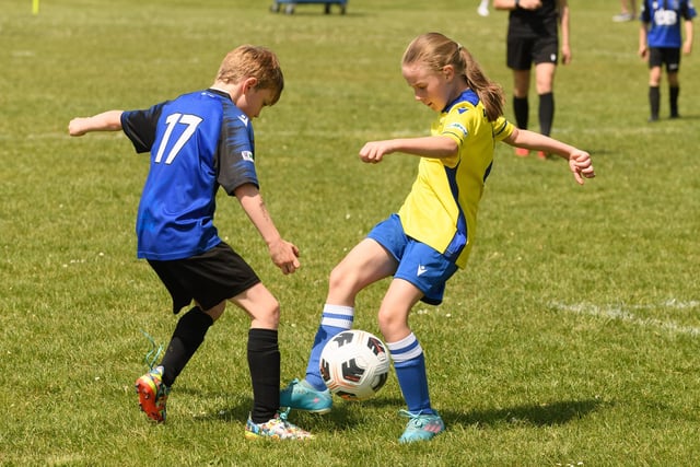 Action from the Clanfield youth football tournament at Horndean Technology College. Picture: Keith Woodland (270521-722)