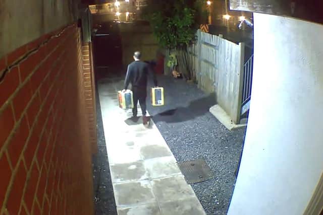 CCTV footage shows two men stealing two cooking oil containers from Bap and Burrito takeaway, in Stoke Road, Gosport, on Saturday morning (June 11) at roughly 3.01am. The picture is a still from the CCTV footage. Picture: Shaz Montasser.