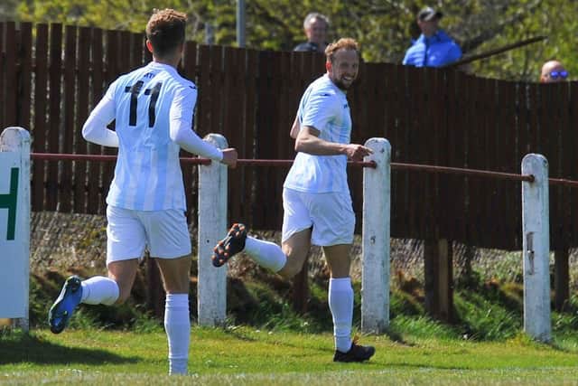 Andy Todd, right, is all smiles after putting US Portsmouth 2-0 up at Tavistock last weekend - his fourth FA Vase goal of the season. Picture: Martyn White.
