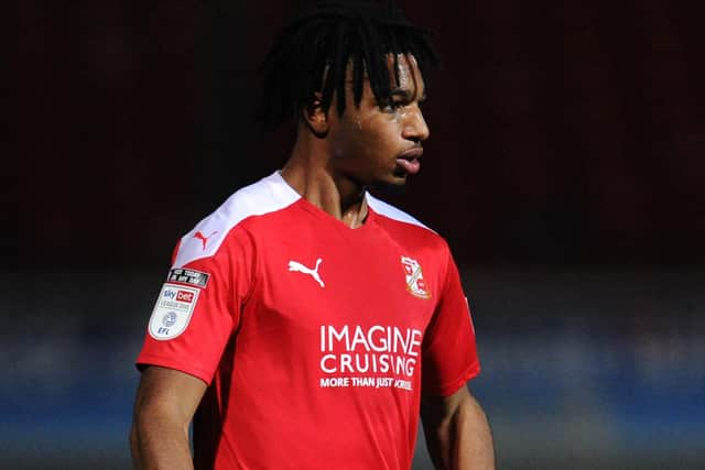 Akin Odimayo, on trial at Pompey, in action for Swindon last season. Picture: Alex Burstow/Getty Images