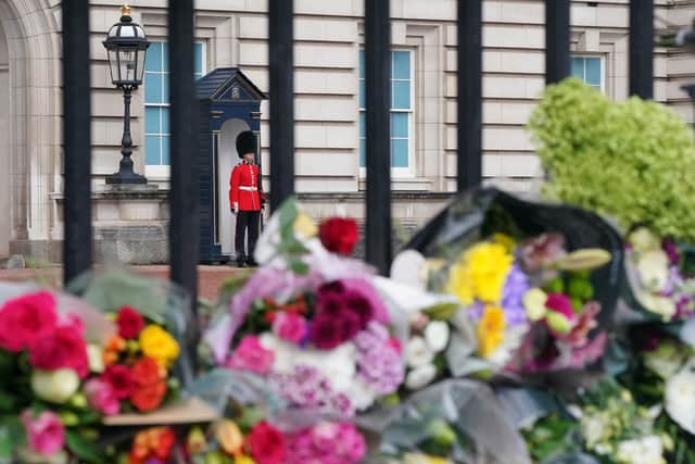 A guard on duty at Buckingham Palace, London, following the death of Queen Elizabeth II. Picture: Dominic Lipinski/PA Wire.