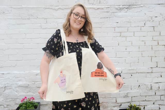 Chelsea Heaton-Penington (29) from Southsea, has created slogan bags to raise money to help victims of sexual violence through Portsmouth Abuse and Rape Counselling Service, which supported her through rape counselling. Chelsea has designed and printed the bags through her business Darling Inks, and all profits are going to PARCS.

Picture: Sarah Standing (130421-6640)