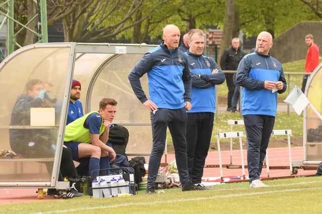 The USP bench of coach Paul Barton (left), assistant manager Fraser Quirke (centre) and boss Glenn Turnbull during the semi-final with Binfield. Picture: Keith Woodland