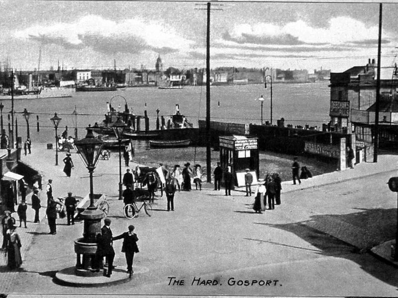 The Hard at Gosport looking across Portsmouth Harbour Circa 1905. To the left is the Ferry Ticket Office. In the foreground is the Gambler drinking fountain.