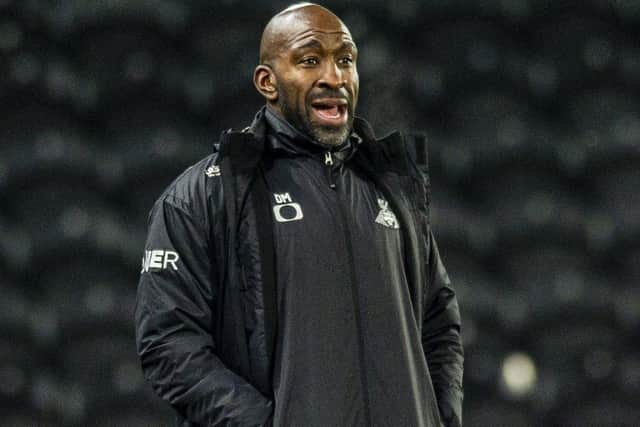 Darren Moore's Doncaster will go top of League One tonight if they beat Shrewsbury. Picture: Tony Johnson