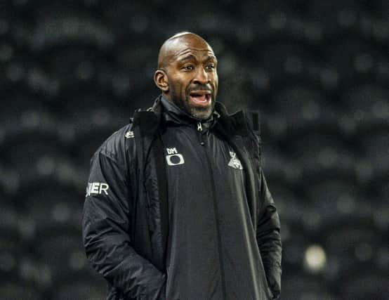 Darren Moore's Doncaster will go top of League One tonight if they beat Shrewsbury. Picture: Tony Johnson