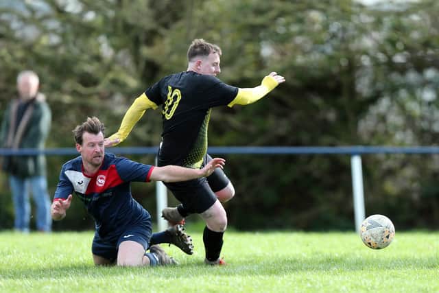 Infinity's Jamie White (yellow/black) is on the brink of helping his club return to the top flight of the Hampshire Premier League.
Picture: Chris Moorhouse