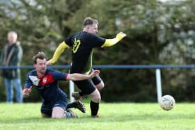 Infinity's Jamie White (yellow/black) is on the brink of helping his club return to the top flight of the Hampshire Premier League.
Picture: Chris Moorhouse