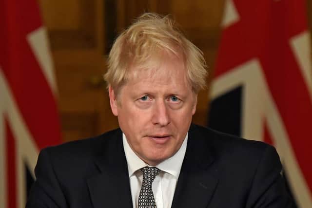 Britain's Prime Minister Boris Johnson announces new lockdown restrictions Picture: Alberto Pezzali/POOL/AFP via Getty Images)