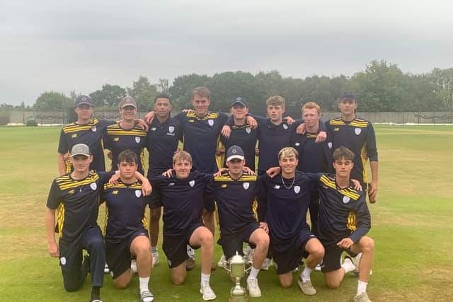 The Academy squad with their league trophy.