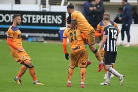 Hawks celebrate Roarie Deacon (21) having put them 2-0 up in their FA Cup win at Bath City. Picture: Kieron Louloudis.