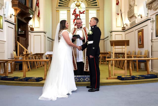 Pictured: Lance Corporal Jake Kennedy & Petty Officer Naval Nurse (QARNNS) Jo Parke at their marriage at St Ann's Church.
