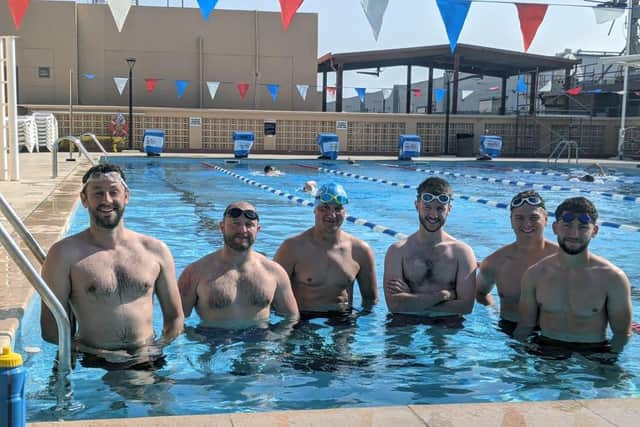 Chiddingfold sailors in the outdoor pool at the US Base in Bahrain. Photo: Royal Navy