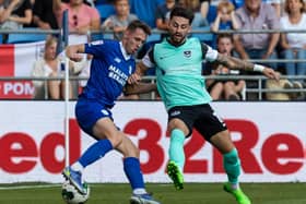 Cardiff winger Gavin Whyte tussles with Pompey wide man Owen Dale for the ball during the Blues' Carabao Cup win over the Championship side last August. Whyte could well be Dale replacement at Fratton Park next season.