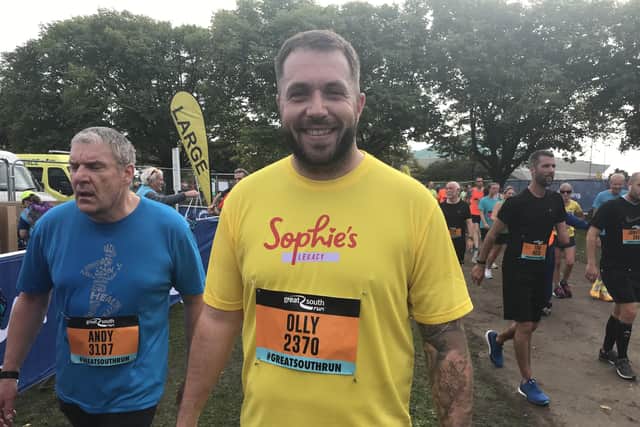 Olly Tobin, 34, has taken part in the Great South Run to support Sophie's Legacy.