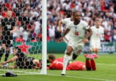 Raheem Sterling of England celebrates after scoring their side's first goal during the UEFA Euro 2020 Championship Round of 16 match between England and Germany at Wembley Stadium. Photo by Catherine Ivill/Getty Images)