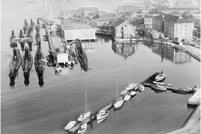 Submarine docks at HMS Dolphin in Gosport. HMS Dolphin was the home of the Submarine Service from 1904 to 1999, and the site of the Royal Navy Submarine School. It is among the treasure troves of photos archivists in Gosport have highlighting the lives of submariners. Credit: Imperial War Museum