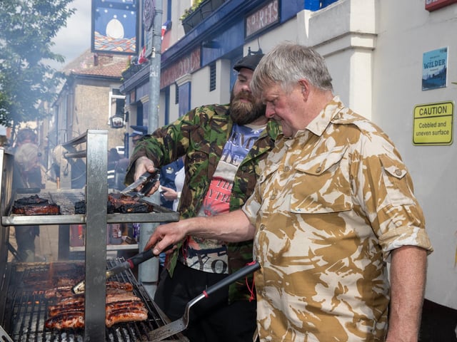 The barbeque in full swing on Duncan Road. Photos by Alex Shute