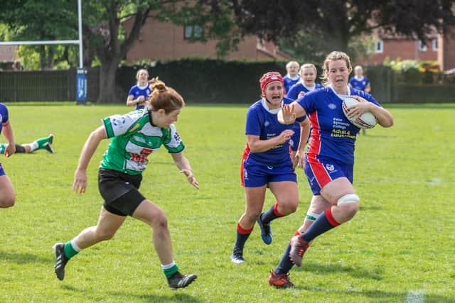 Hampshire's co-captain Jess Rudd runs in a last-minute try. Picture: Mike Cooter