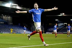 George Hirst last night netted his first Pompey goal in 14 appearances - and it sent them into the next round of the Papa John's Trophy. Picture: Robin Jones/Digital South