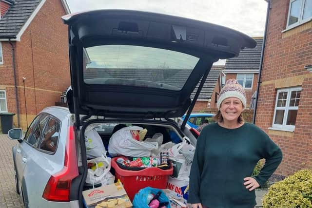 Susan Bonnar with just one of the full cars worth of essentials for the Fareham and Gosport Basics Bank.