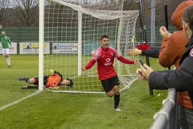 Jack Breed celebrates heading the only goal for Fareham against Hythe. Picture by Ken Walker