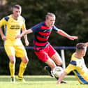 Zak Willett (red/blue) has scored 80 goals in just 36 appearances for Paulsgrove and Southsea United this season. 
Picture: Chris Moorhouse