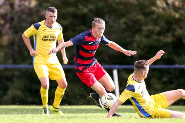 Zak Willett (red/blue) has scored 80 goals in just 36 appearances for Paulsgrove and Southsea United this season.
Picture: Chris Moorhouse