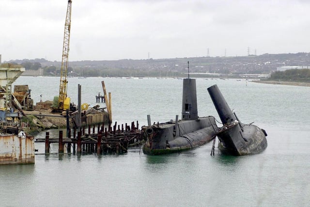 O-Class Submarines two of the boats formerly based at HMS Dolphin, Gosport, now waiting to be cut-up for scrap at Pound's shipbreakers yard at Tipner, Portsmouth. Picture: Michael Scaddan 006051-0018