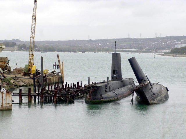 O-Class Submarines two of the boats formerly based at HMS Dolphin, Gosport, now waiting to be cut-up for scrap at Pound's shipbreakers yard at Tipner, Portsmouth. Picture: Michael Scaddan 006051-0018