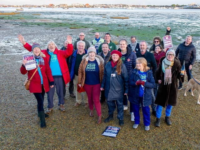 Stop Aquind protestors with Cllr Steve Pitt, Council leader, Gerald Vernon-Jackson, Cllr Lee Hunt celebrate near Lock Lake, Portsmouth in January after it was turned down
Picture: Habibur Rahman