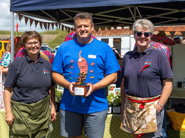 Members of the Gosport based Shore Leave Haslar with their home-grown chilli plants. Pictured: Nicola Canning, Andy Day (volunteer, ex RN) and Chris Robson (Project Lead, ex RN). Picture: Mike Cooter (210522)